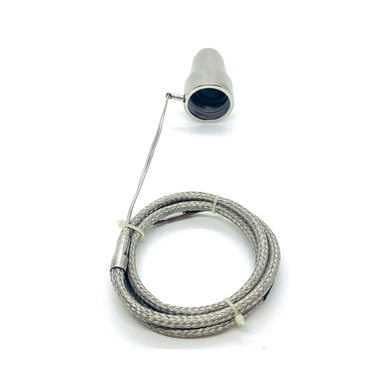 Calentador de canal caliente con bobina de abrazadera axial